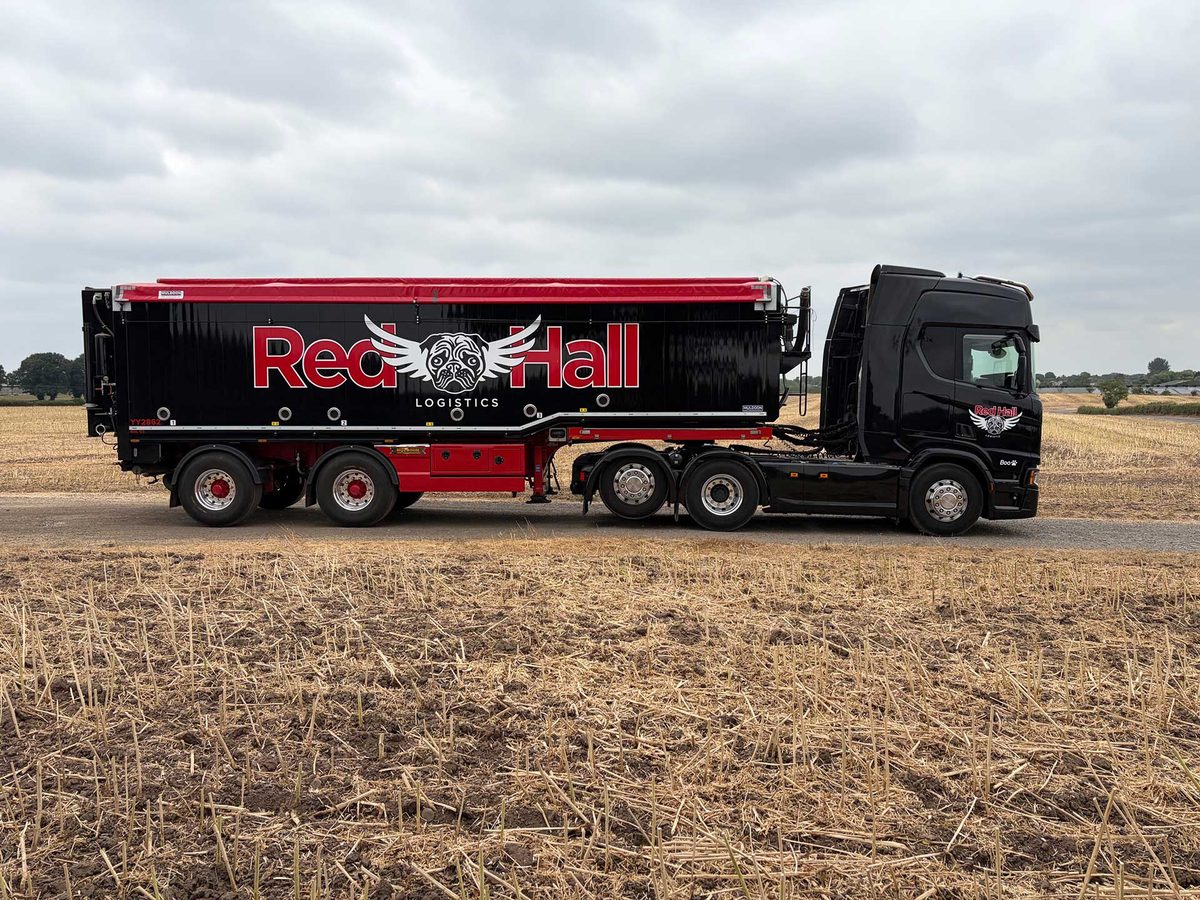 Red Hall Logistics Scania and feed trailer on a farm track in Cheshire